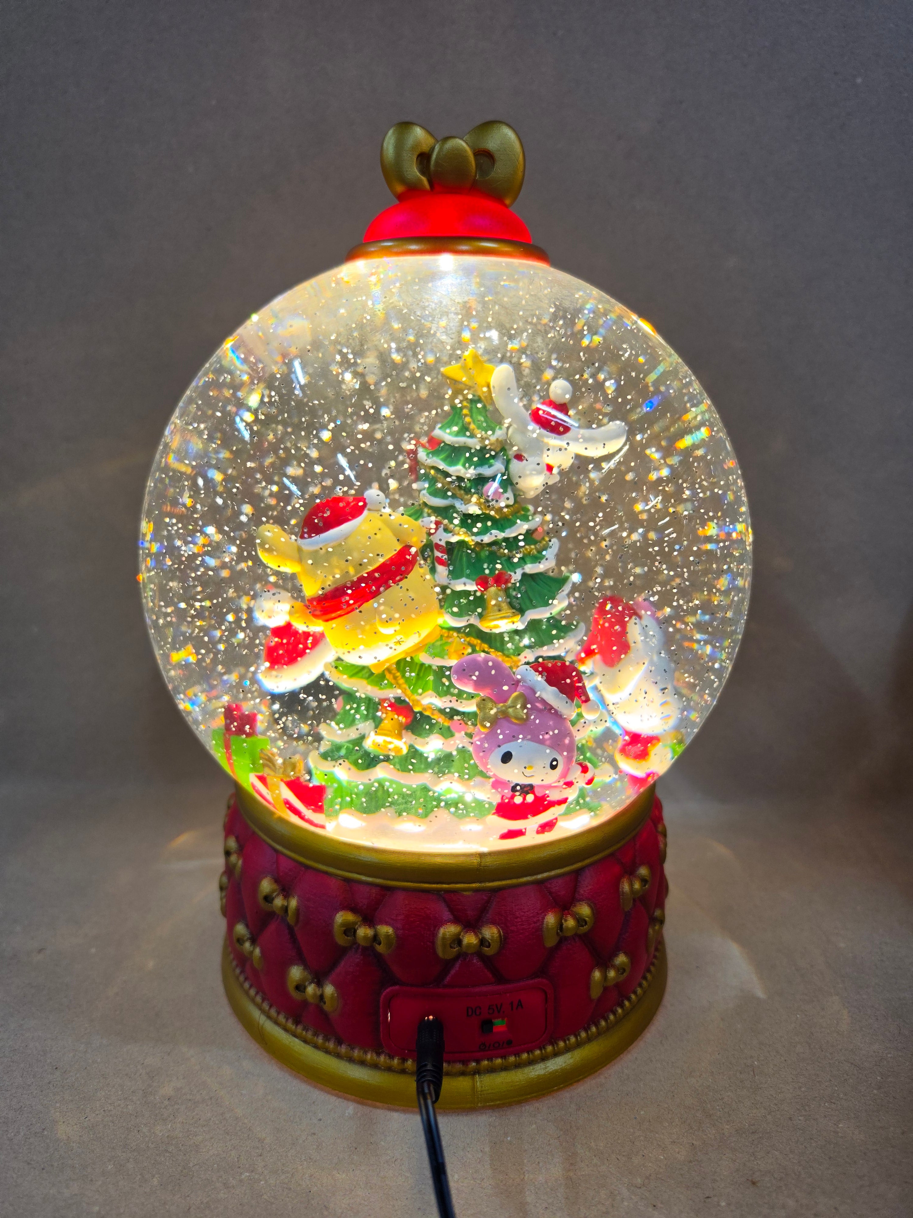 Disney Hello Kitty snowglobe spinning