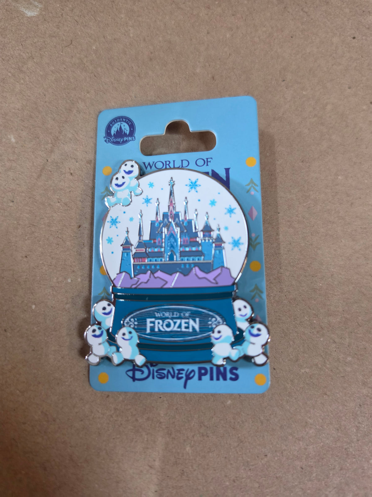 Frozen snowglobe pin